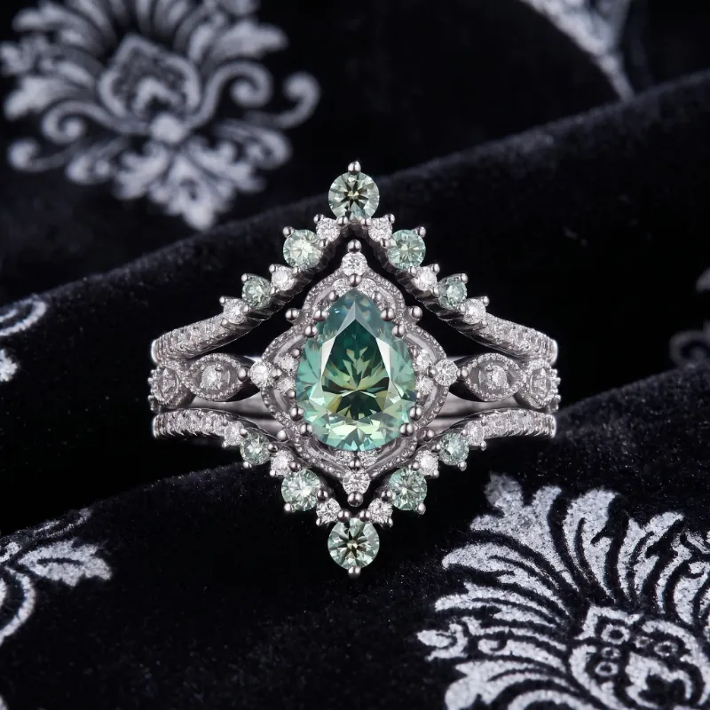 Starlandus Elara vintage pear cut green moissanite engagement ring set with milgrain detailing