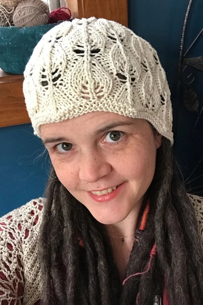 Kristen TenDyke Rebirth Hat showing leafy lace knit pattern