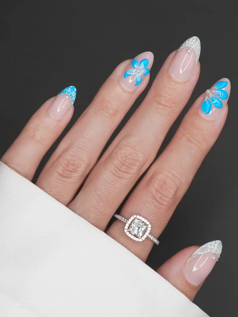 Roxy Nails Paris Saint Lucia press-on nails with blue floral art, 3D waves and pearl accents