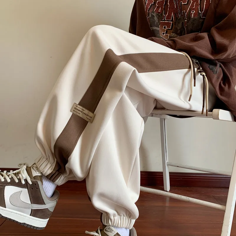 Juwas Autumn Winter Loose Plus Size Harem Casual Pants showing the tapered legs and drawstring waist on a mannequin.