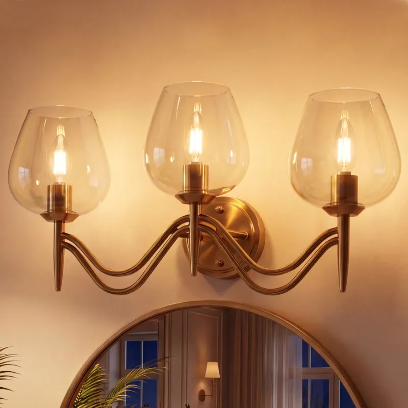 Tribesigns 3-light Bathroom Vanity Light gold metal and clear glass wall sconce with wine-glass design