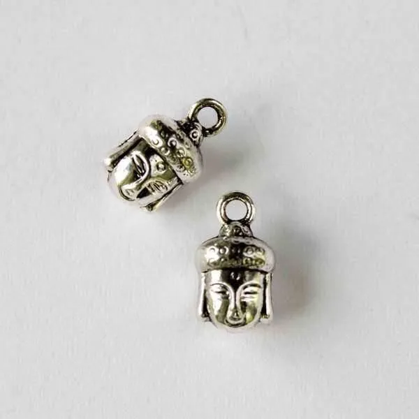 Cherry Tree Beads Silver Pewter 8x14mm Buddha Head Charm, 10 per bag, shown close up