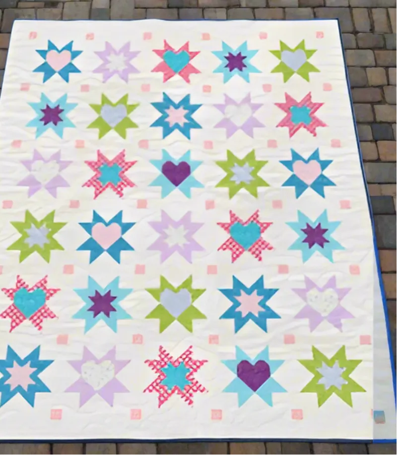Boho Blanket Heartfelt Stars Quilt Pattern product photo showing the large finished quilt