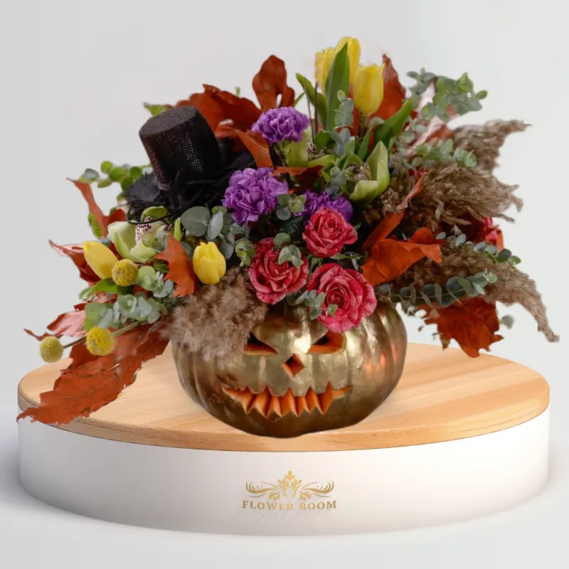 Flower Boom Dallas 24K Pumpkin with fresh fall flowers in gold painted pumpkin container