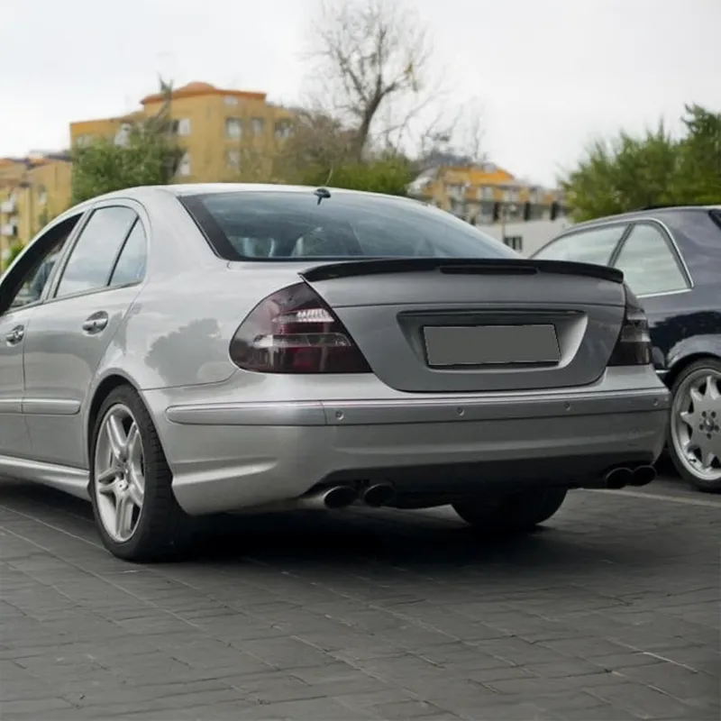 Twenty Two Tuning Aero Style Carbon Fiber Rear Spoiler Compatible With Mercedes E-Class/E55/E63 (W211) showing trunk spoiler with brake ligh