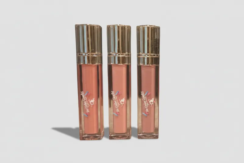 Viva Koutour Cosmetics Signature Lip Gloss Collection tubes in assorted shades