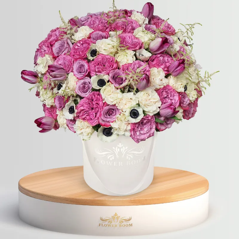 Flower Boom Dallas Lavender Whisper arrangement with garden roses tulips and anemones in purple and white
