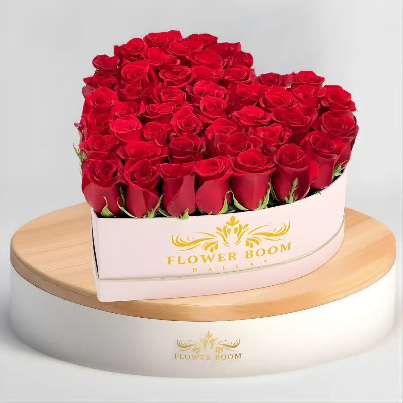 Flower Boom Dallas Red Roses In A Heart Shaped Box with fresh red roses arranged in luxury heart-shaped container