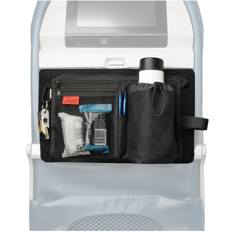 Lusso Gear Airplane Tray Table Cover & Organizer draped over an airplane tray table with zippered pockets visible