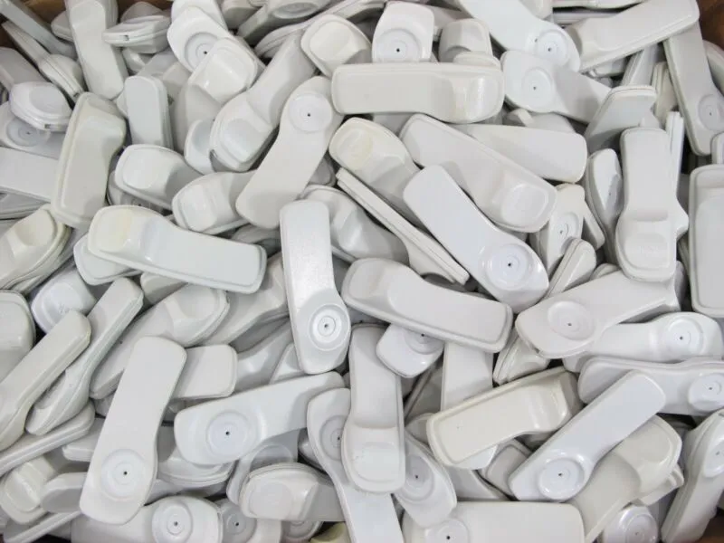 ZeereeZ 250 Sensormatic Supertag security tags original EAS 58KHz with backs, gray tags piled together