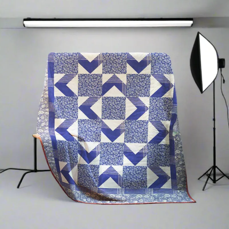 Boho Blanket In the Box Quilt Pattern cover showing a bold graphic quilt in multiple sizes