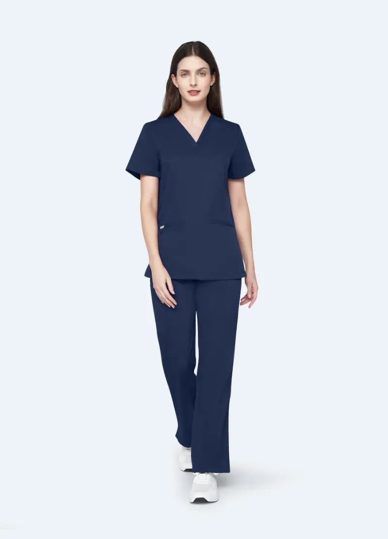 COMENII StyleFlex 7-Pocket Essential Scrub Set in navy blue with top and pants
