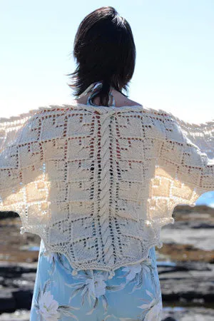 Kristen TenDyke Petrel Shawl knitting pattern in natural undyed wool with lace and cable detail