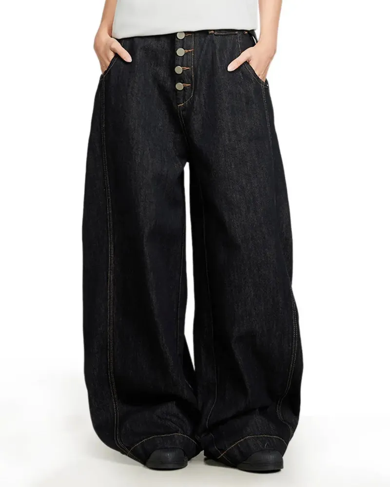 INFLATION Black Buttons Up Barrel Baggy Jeans in black denim with button fly and wide barrel leg silhouette