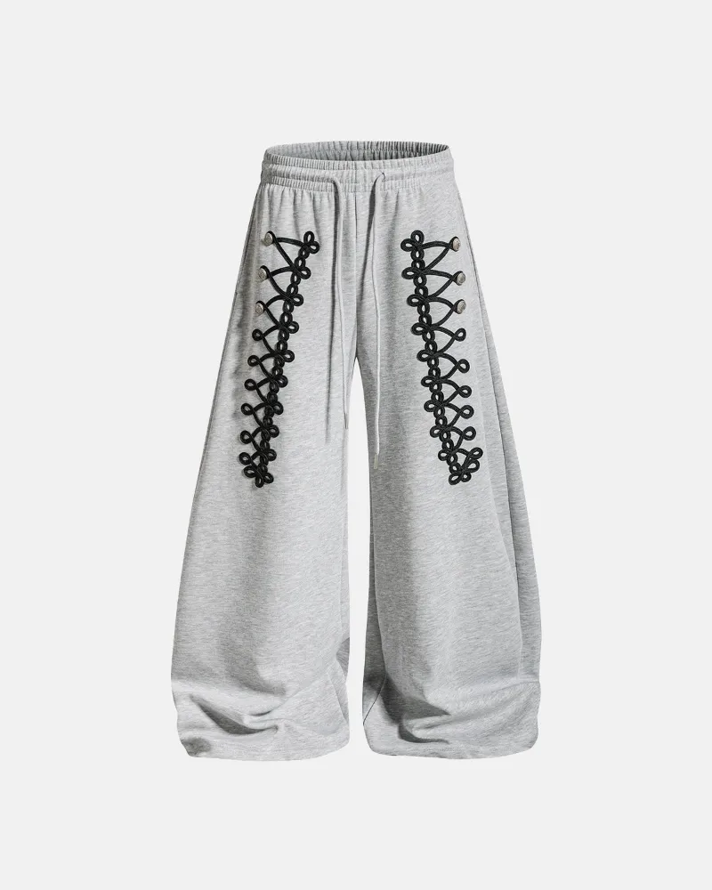 INFLATION Braid Detail Barrel Sweatpants with ornamental braid trim and metal button accents