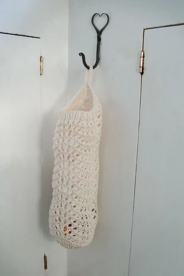 Kristen TenDyke Feather and Fan Bag Bag showing lace stitch pattern for plastic bag storage