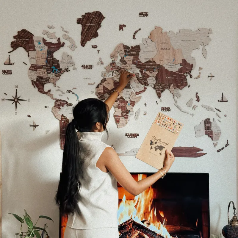 Enjoy The Wood 3D Wooden World Map Cappuccino in pastel brown tones on display