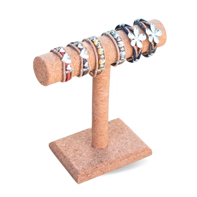 Corkadia 100% Pure Cork Single-Layer Bracelet Display Stand shown holding a bracelet on a natural cork surface