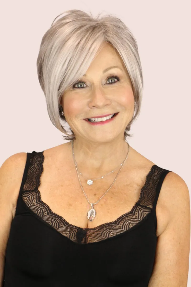 Godiva's Secret Wigs Kelly short wig in Silver Stone with teased crown and layered sides