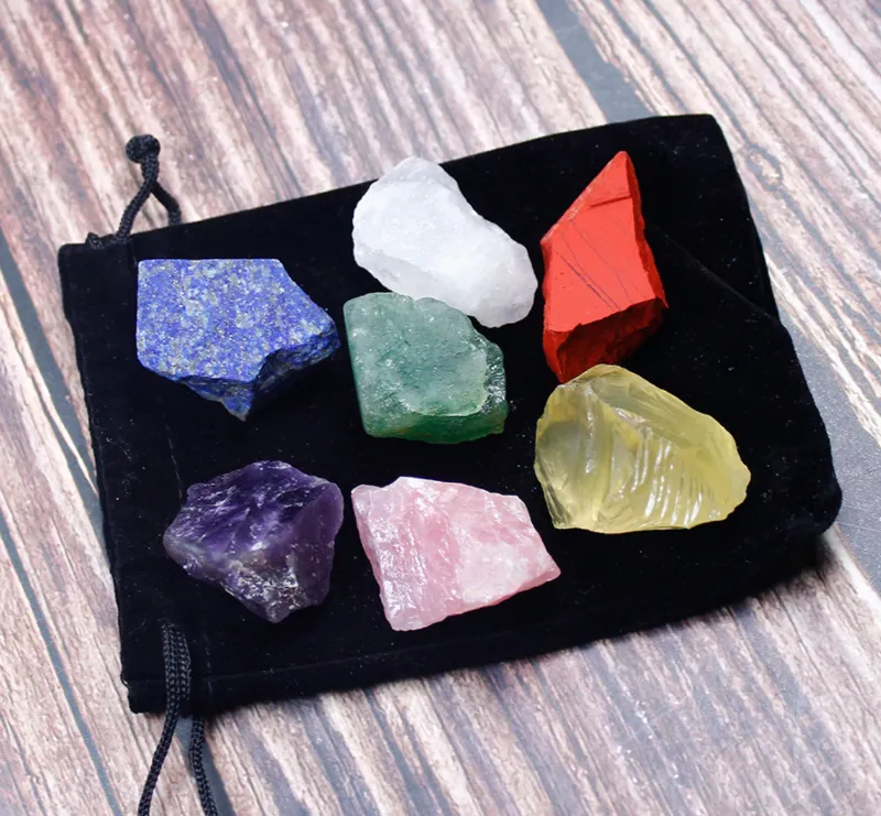 Turix 7 Chakras Raw Crystal Set displaying seven unpolished natural healing stones with bag