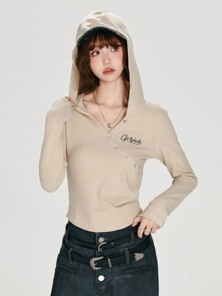 Juwas Apricot Hooded Long Sleeve Top showing ribbed knit fabric and drawstring hood
