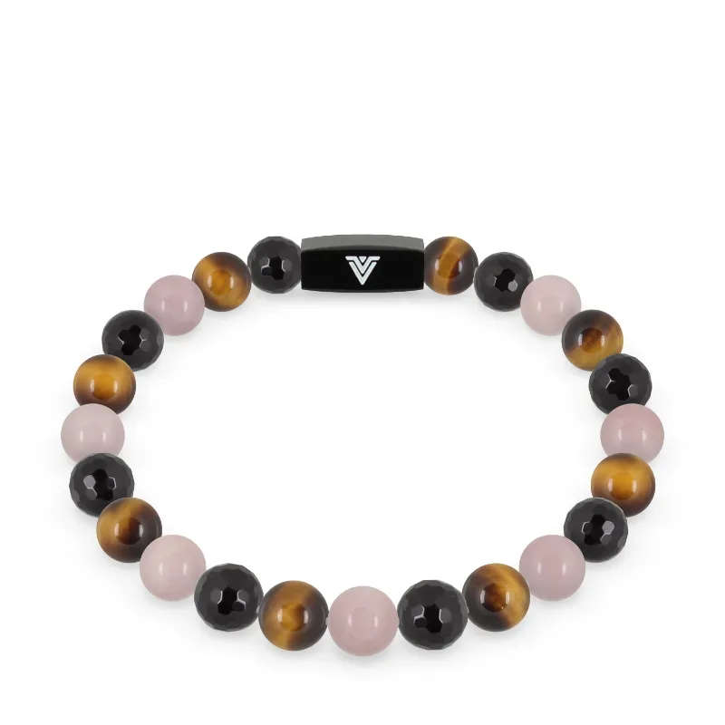 VOLTLIN Leo Zodiac Stretch Bracelet on black suede pouch with onyx, tiger's eye, and rose quartz beads