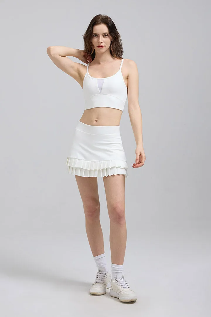 SALTUM Criss Cross Sports Bra and Double Pleated Mini Skirt Set in matching activewear fabric
