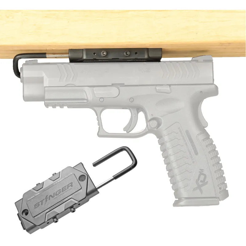 The Stinger Tools Stinger U2 Magnetic Gun Mount with inner barrel support on vehicle dashboard