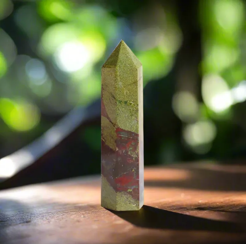 Turix Dragon Bloodstone Crystal Point in green with red markings, approximately 8 to 9 cm tall