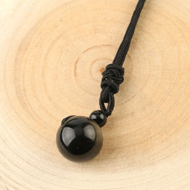 Turix Black Onyx Sphere Necklace with polished crystal pendant on adjustable cord