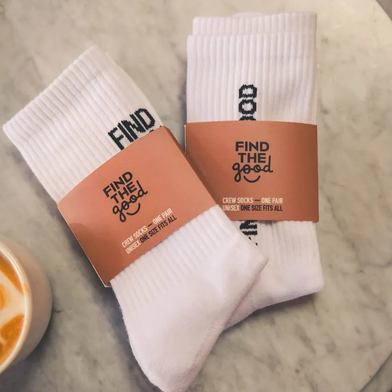 Find The Good Brand The Good Crew Socks white cotton crew socks with Find The Good text in two designs