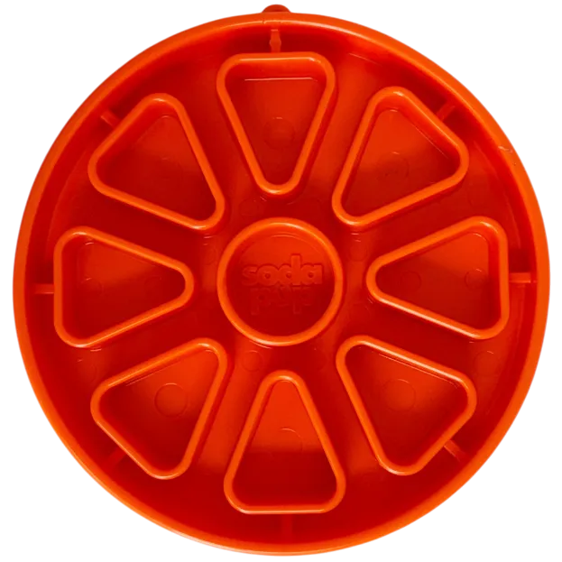 Soda Pup Citrus Softie eTray shallow slow feeder dog bowl with orange citrus pattern on a smooth floor