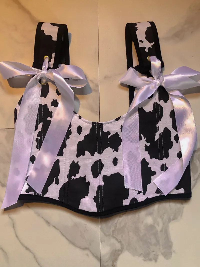 Bit By Angie Cowgirl corset in cow print fabric