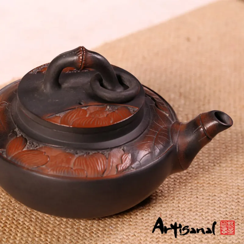 Wild Tea Qi Heaven Eye Jian Shui Pottery Teapot in purple clay with eye design