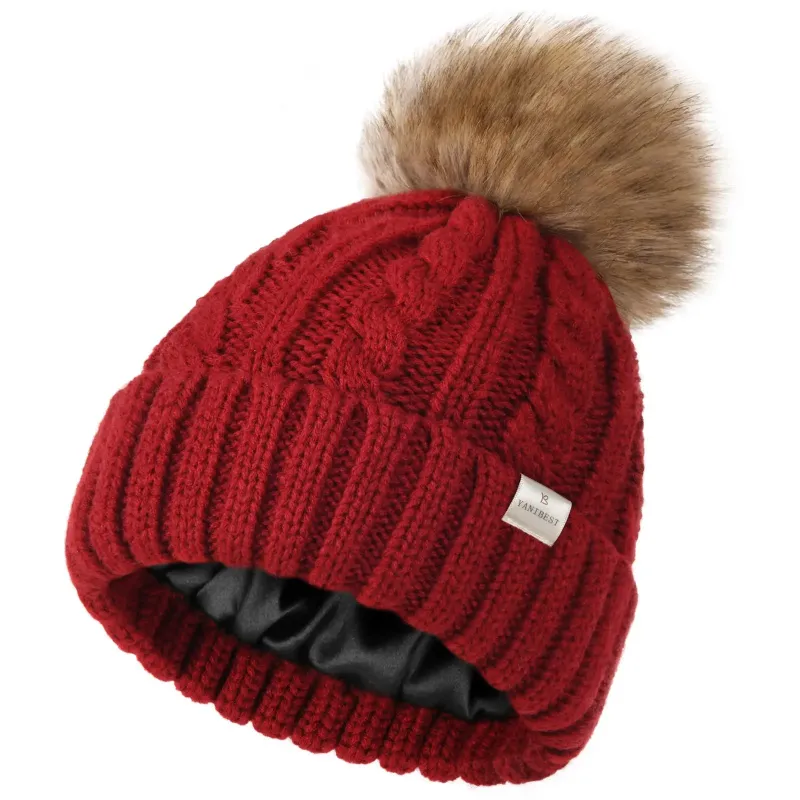 Yanibest Butter Satin Lined Pom Winter Beanie in Wine Red showing detachable faux fur pom
