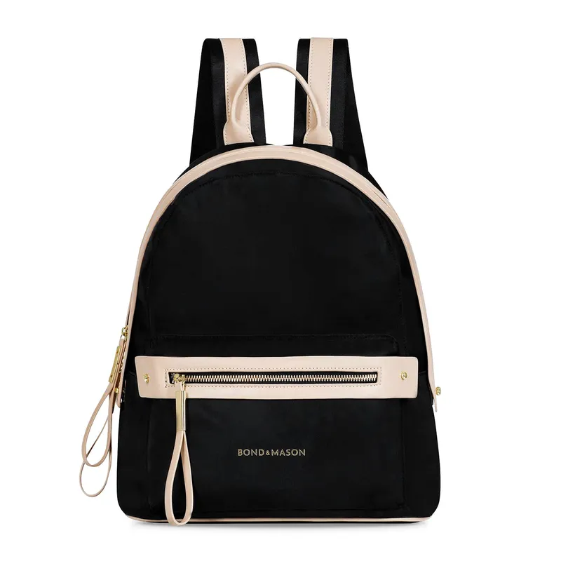 Bond & Mason The Melanie Backpack shown as a larger nylon and vegan leather backpack with gold hardware