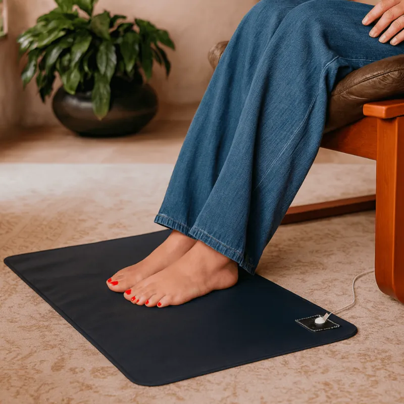 Premium Grounding Mat placed on bed with person's legs resting on it