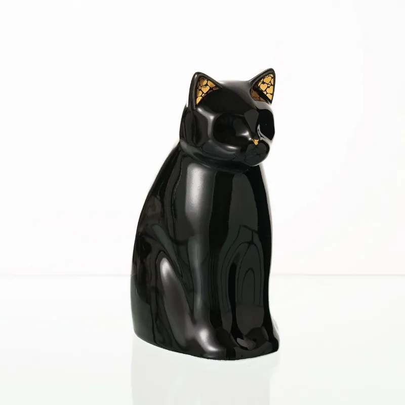 Pulvis Art Urns Meow Pet Urn for Cat in black handmade ceramic with gold accents on ears