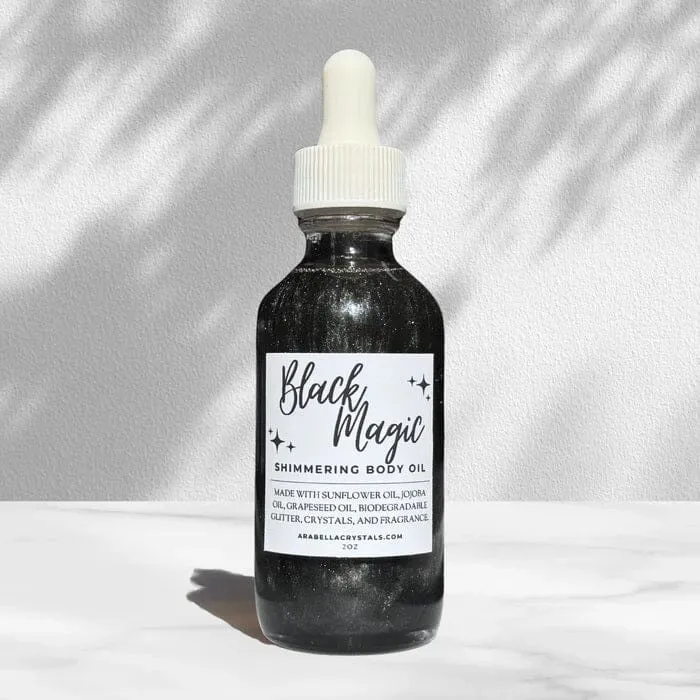 Spirit Nest Black Magic Shimmer Body Oil with biodegradable glitter and crystal chips