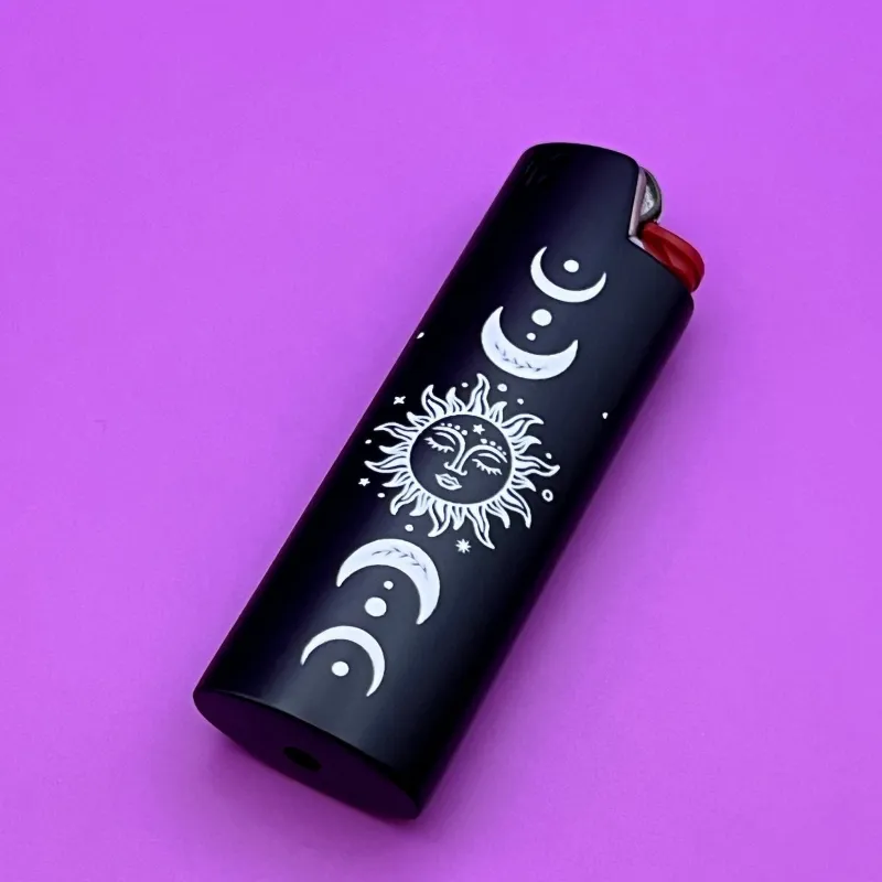 High Dreams Lighter Case Sun Moon showing metal sleeve with bohemian celestial print