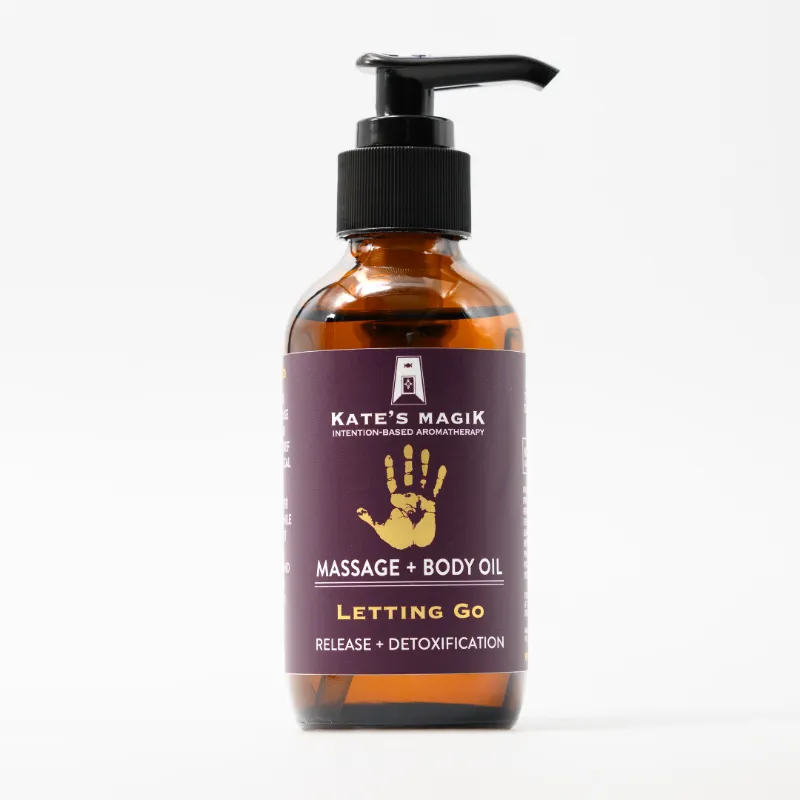 Kates Magik Letting Go massage and body oil bottle with green herbal label