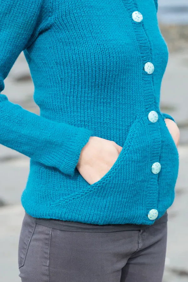 Kristen TenDyke Sati Cardigan knitting pattern showing buttoned cardigan with pockets