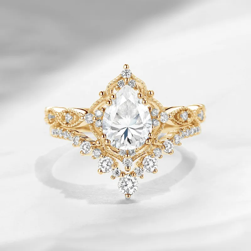 Starlandus Elara Antique Pear Cut Colorless Moissanite Engagement Ring Set with delicate openwork frame