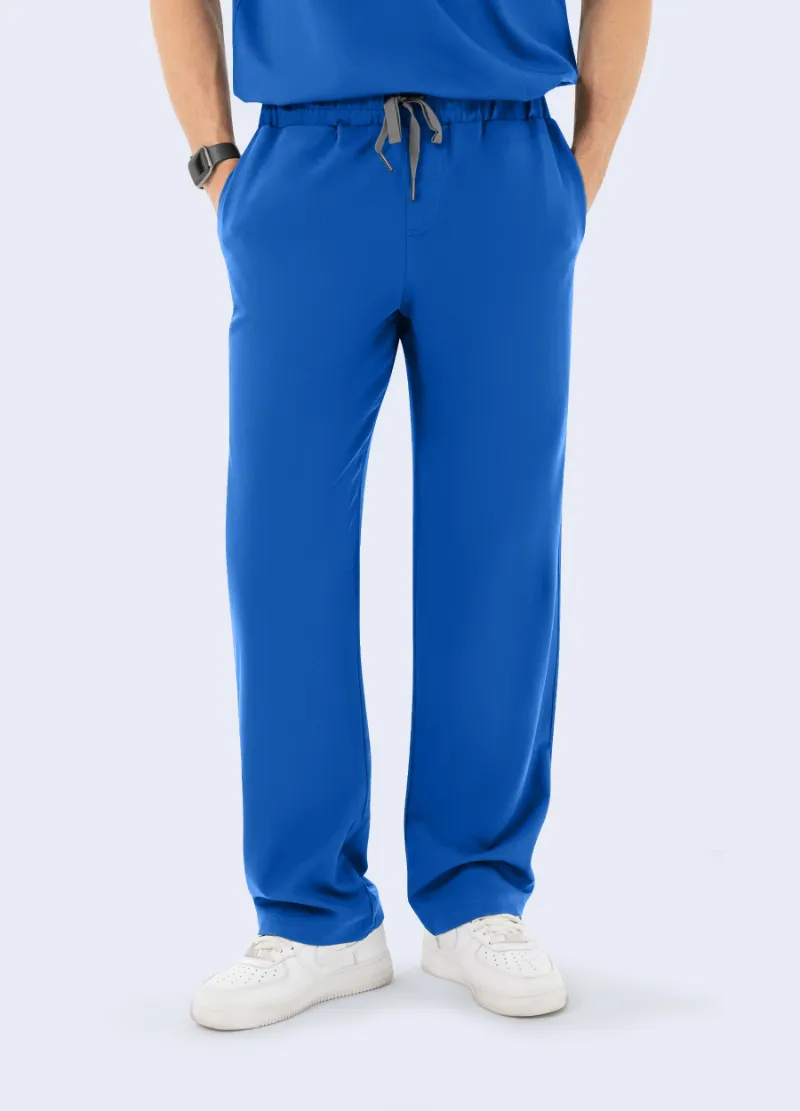COMENII DynaComfort™ Essential Scrub Pant in Royal Blue shown full-length, highlighting the colour, straight-leg fit and pockets