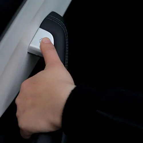 Tesstudio Carbon Fiber Door Button Trim showing framed door-release control with protective surround for Tesla Model 3 Highland, Model Y Jun