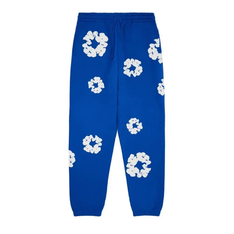 AfewVibe Denim Tears The Cotton Wreath Sweatpants Royal Blue in royal blue with puff-printed panels