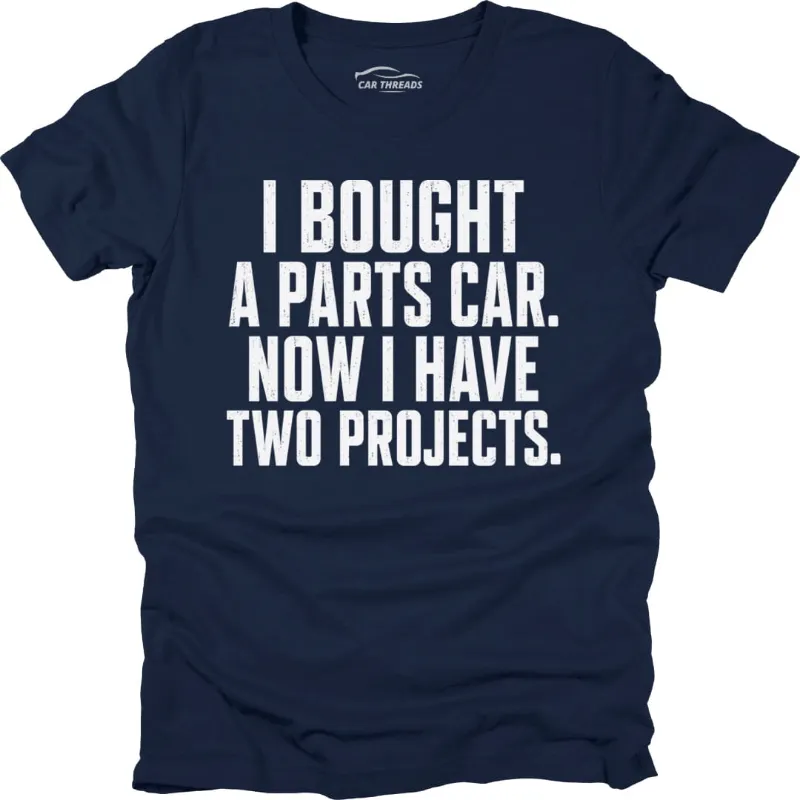 Car Threads I Bought a Parts Car T-shirt photographed on a plain background