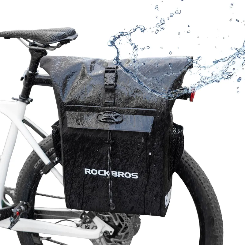 RockBros US 2-in-1 Bicycle Rear Rack Bag Backpack showing black waterproof pannier with roll-top closure mounted on bike rack