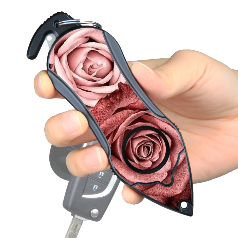 The Stinger Tools Stinger Personal Safety Alarm Keychain in Twin Rose design showing siren, cutter, and glass breaker