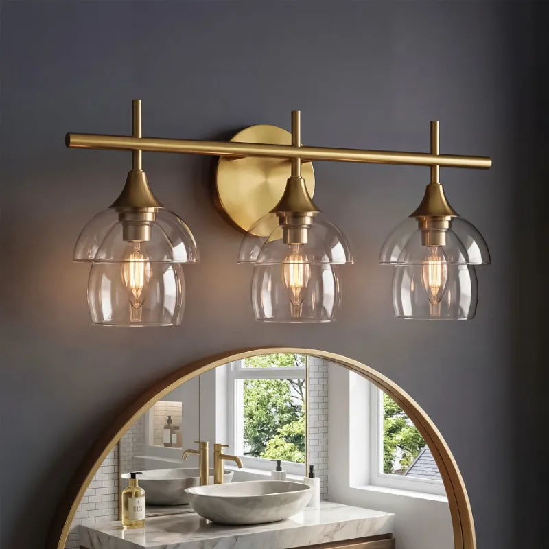 Tribesigns 3-Light Bathroom Vanity Light with gold finish and clear glass shades
